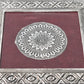 Top view of the silver pooja chowki, showcasing its exquisite mandala pattern and finish.