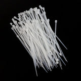 Bundle of 3x100mm heavy-duty black nylon cable ties, ready for use.