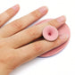 Clean silicone facial cleansing brush after use, showing its hygienic design.