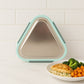 Close-up of Ganesh Trinity triangle lunch box leak-resistant locking clip