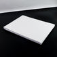 White A4 self-adhesive label sheets stacked neatly for printing