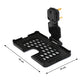 Wall-mounted PHOBIA black phone charging holder in use, keeping the device safe.