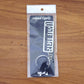 Side view of metallic Gujarati script keychain for car and bike keys