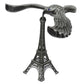 A hand demonstrating the Balancing Eagle Toy's stability by placing it on a fingertip, separate from its stand.
