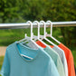 Close-up view of a single durable white plastic clothes hanger