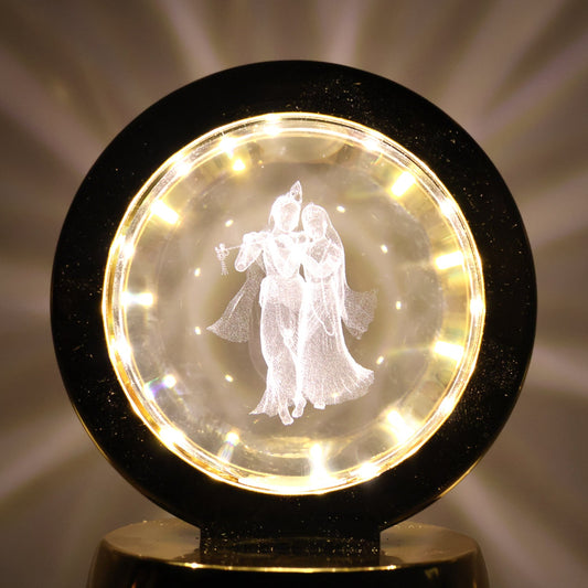Golden base Radhe Krishna decorative lamp emitting soft ambient LED light