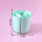 Rotating pen holder close-up showing stable base and compartment design