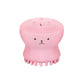 Octopus facial massager stimulating skin for improved product absorption.