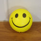 Cute smiley face foam stress ball for relaxation and therapy