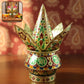 Ornate lotus crown kalash enhancing spiritual ambiance during rituals