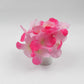 A vibrant LED flower light showcasing its intricate petals and soft glow.