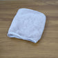 Soft microfiber towel wrap drying hair without causing frizz or damage