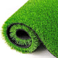 The soft synthetic grass mat positioned on a balcony floor, enhancing outdoor decor.