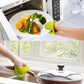 Bright red silicone heat resistant potholder with a textured grip.
