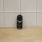 Blue AOE roll-on deodorant with label and cap attached