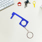 Hand holding Safe Touch Tool metal keychain used for hygienic door opening
