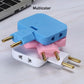 Angled view of the 3-in-1 socket converter plugged in, demonstrating its slim profile.