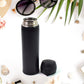 Child holding a vibrant 500ml kids insulated water bottle, perfect for school.
