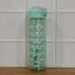 Water bottle displayed with gym and outdoor gear for active lifestyle