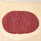 Detail shot of textured red floor mat for indoor use