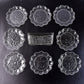 9-piece plastic bowl set with serving tray displaying transparent bowls and plates