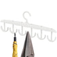 Efficient closet organization using the Organivo 12-hook rotatable tank top hanger.