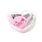 The portable stationery kit with all its components, including paper clips, ready for use.