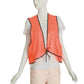 Close-up view of the tie closure on a fluorescent yellow PVC safety vest, highlighting its adjustable design.