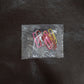 Colourful vinyl-coated paper clips securely holding important files and documents together.