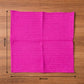 Microfiber cleaning cloth in use wiping a smooth surface