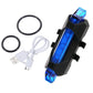 Hand holding the blue rechargeable LED bicycle light, showing its portability and ergonomic design.