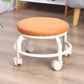 Low height rolling stool in white, designed for easy movement across floors.