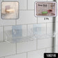 Close-up view of clear transparent soap dish holder mounted on bathroom wall