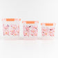 Stackable floral food storage container set with transparent bodies.