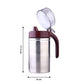 Compact stainless steel oil dispenser, perfect for any kitchen countertop.
