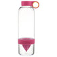The Citrus Juicer Bottle filled with water and vibrant fruit slices, perfect for healthy hydration.