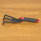 Garden maintenance with plastic hand garden cultivator