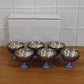 Modern stainless steel bowls for serving snacks or desserts