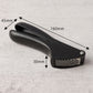Angled view of a manual garlic press crusher tool showing construction