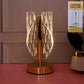 Elegant crystal-effect LED table lamp illuminating bedside table