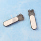 Adhesive push pull door handle mounted on cabinet door