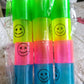 Multicolor slinky spring toys presented in a pile, ideal for gifting or party favors.