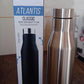 Vacuum insulated water bottle in use, keeping beverage temperature consistent