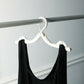 Compact foldable hangers suitable for a wide range of clothing, ideal for travel and home use.