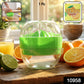 Close-up view of manual citrus juicer pressing fresh lemon juice