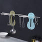 Detailed view of the push-up mechanism and hook rotation on the wall hanger.