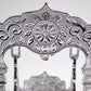 Elegant silver-coated Bal Gopal Jhula enhancing pooja room décor