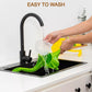 Hand pressing an orange in the manual juice squeezer, demonstrating its efficiency.