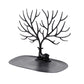 Jewellery display stand with deer antler design holding earrings