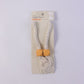 Stylish magnetic strap for curtains, demonstrating its flexible use.
